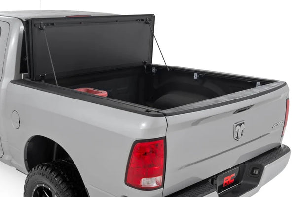 Hard Tri-Fold Flip Up Bed Cover 6'4" Bed | Ram 1500 (10-18)/2500 (10-25)