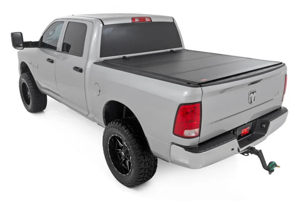 Hard Tri-Fold Flip Up Bed Cover 6'4" Bed | Ram 1500 (10-18)/2500 (10-25)